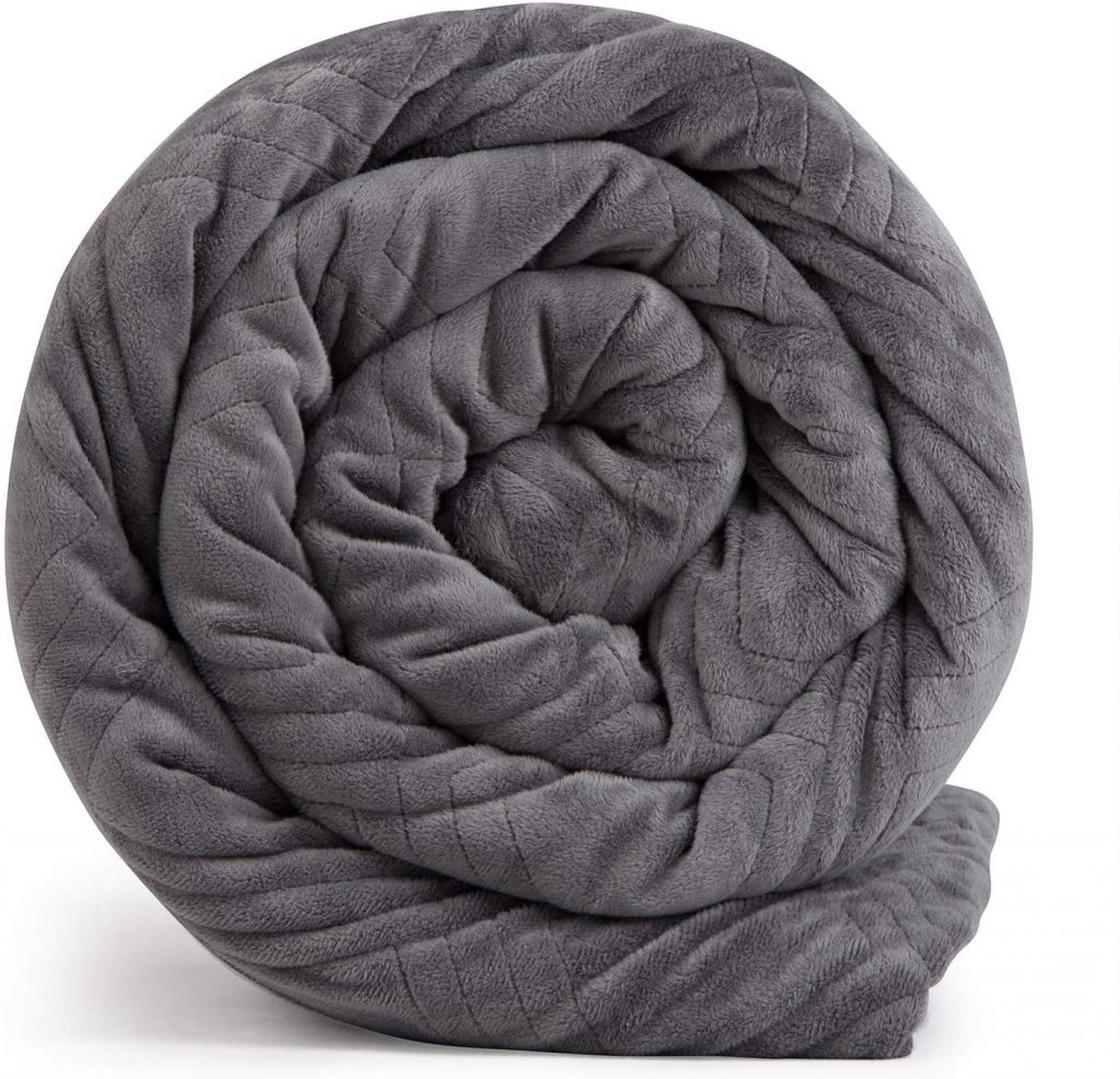 HUSH Classic Weighted Blanket rolled up against white background