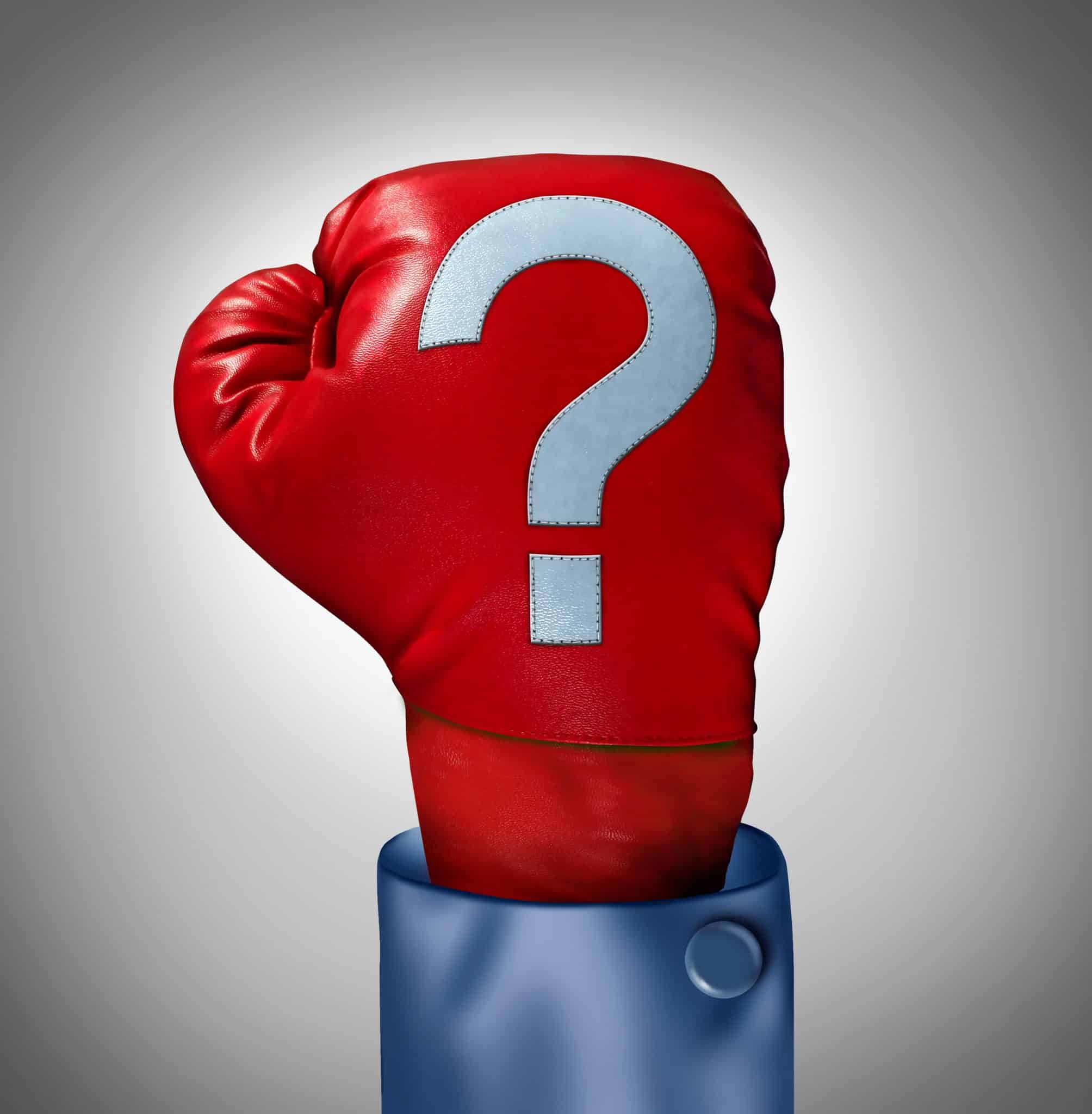 red boxing glove with grey question mark
