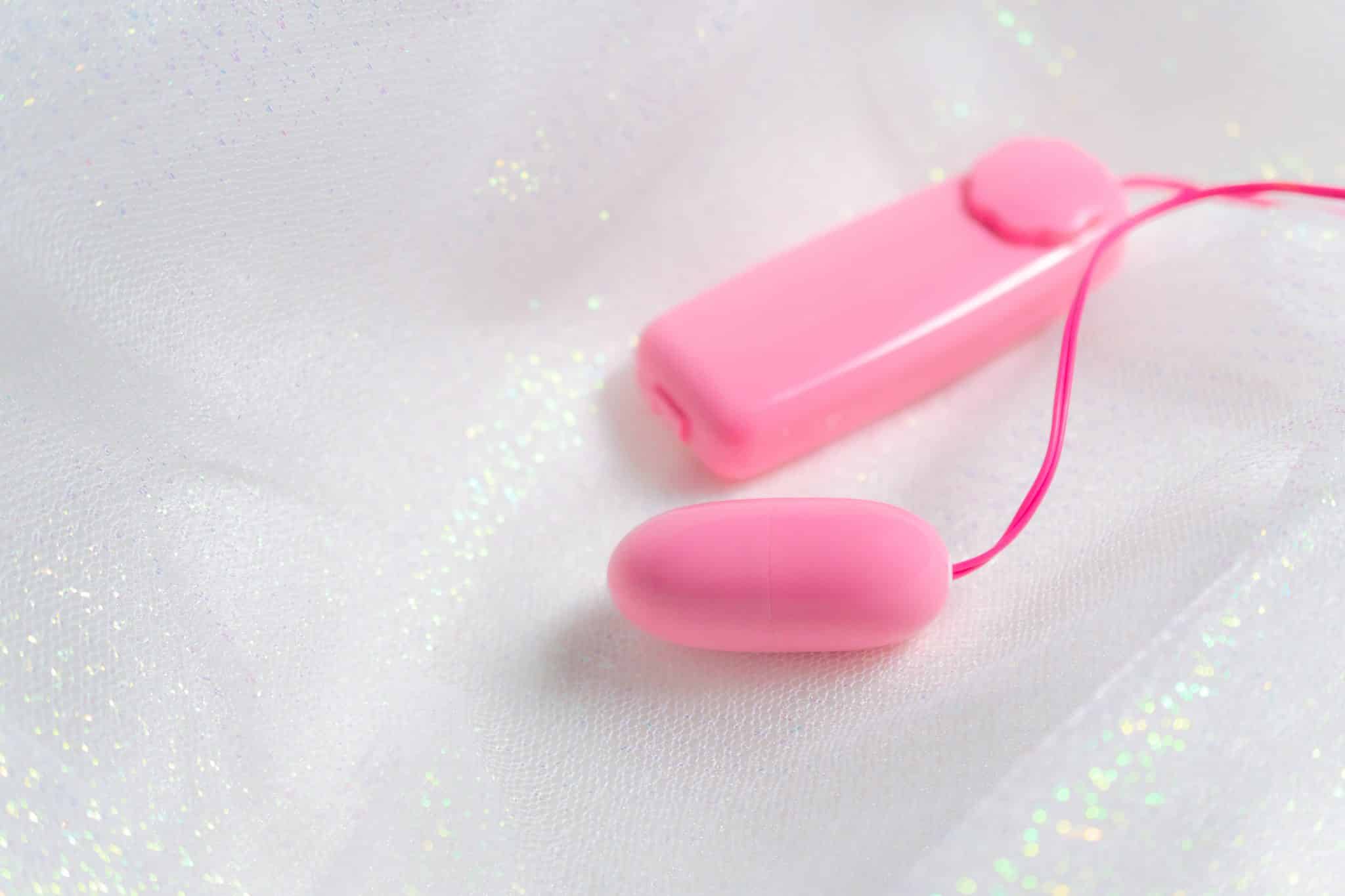 Vibrating,Egg,Shake,Pink,On,A,White,Background.,Sex,Toy